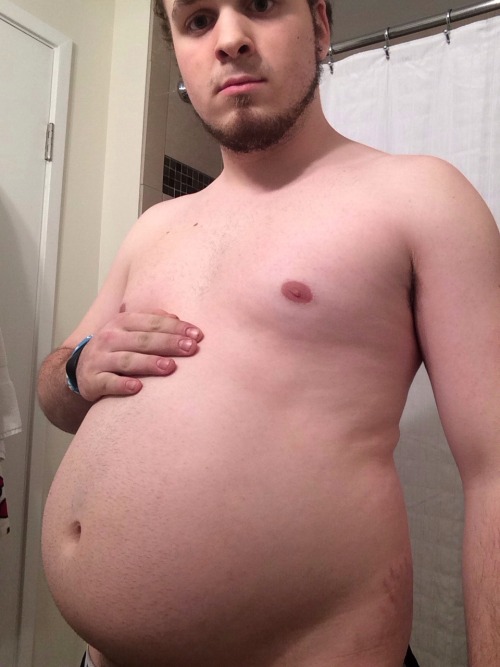 bellylover111:  So I obviously keep growing 😏  Im so stuffed and inflated… It hurts to move, I feel so huge and round! I decided to see how much i could eat tonight and then seeing and feeling the massive size of my giant gut decided ‘hey why not
