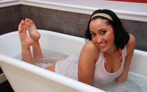 worldoffeet:  Beautiful brunette showing her feet with purple painted toenails