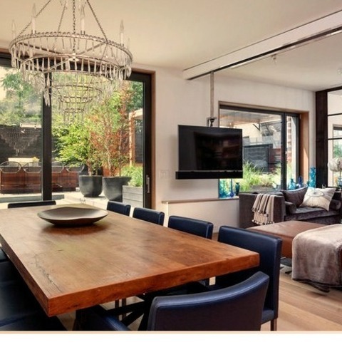 Great Room In San DiegoMid-sized Modern Great Room Idea With White Walls, A Light Wood Floor, And A Beige