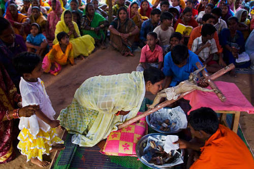 Indian Christians during Good Friday at a relief camp in the village of Mondesore, Odisha, on April 