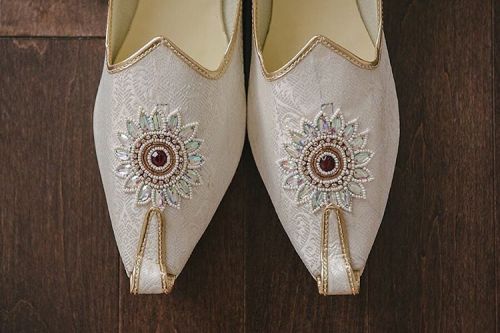 Here we have Mojari. They are traditional South Asian footwear (worn by the groom, in this instance)