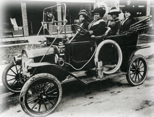 tayfromthabay:  skyakacielo:  Look at this amazingly dope picture of Madam CJ Walker cruisin down the street with her squad. Serving all the looks in the world looking like money and power  Wit her woes