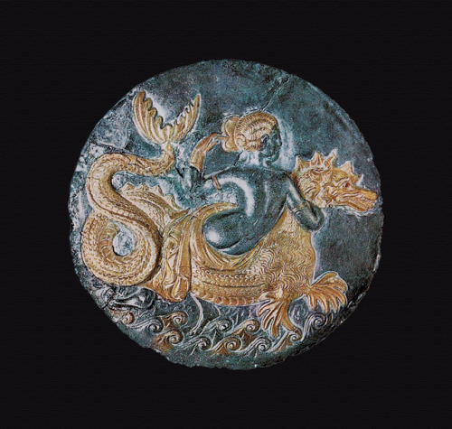 archaeologs:Lid of a gilt silver box, with a nymph riding a sea-monster (ketos), found near Tarentum