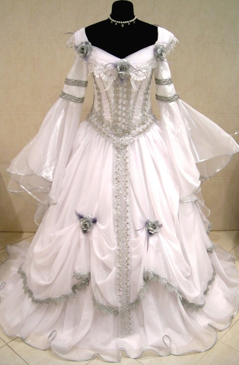 traianbloodshade-ooc:  goldenswallowtail:zombie-spiders:royals-and-quotes:Vintage Medieval Weddings Dresses  I love these so much  GIVE THEM TO ME   I would grocery shop in these