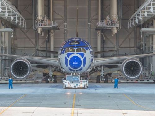 archatlas:  Boeing & ANA unveil R2-D2 Dreamliner Star Wars theme music played and Storm Troopers held guard as the hangar doors began to open. Within moments, a Boeing 787 “Dreamliner” painted with likeness of R2-D2 emerged to a cheering crowd