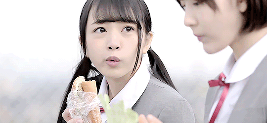 akb48g-gifs:  Mion eating with Sakura-tan and judging her for eating a piece of cabbage