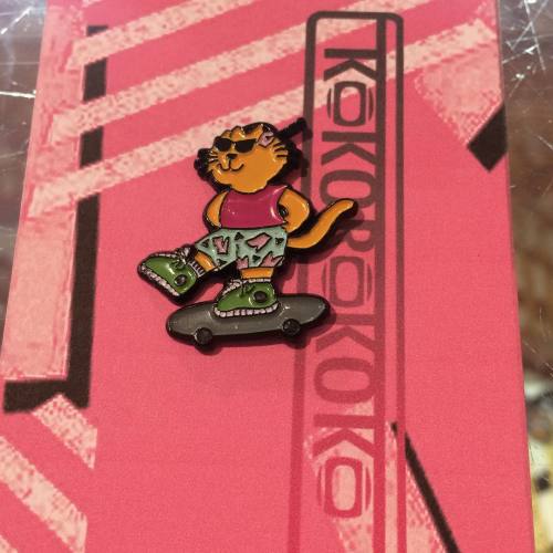 Woah! We are excited to reveal our first Kokorokoko enamel lapel pin. The image is based off of a vi