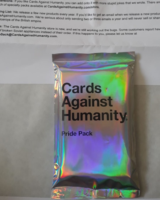 uristmcdorf: seshrat:  seshrat:  so the cah pride pack has options for buying it “with glitter" and “without glitter” and knowing cards against humanity they just tip like 3 tablespoons of fucking glitter into the pack of cards and send it