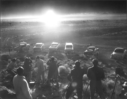 Photographers and reporters gather near Frenchman Flat to observe the Priscilla nuclear test