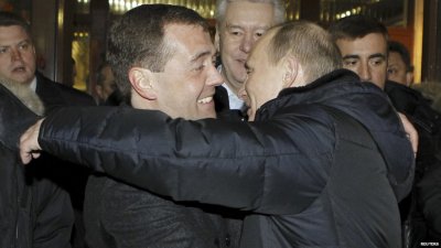 Medvedev: Vladdy, we no hide, we make love in Red Square of middle!
Me: Orthodox Church is 70% Russia, we shall poll like Cossacks.
Medvedev: Nyet care polls, elections is phony.
He has head in clouds, he has head touching orbit of Sputnik. He is...