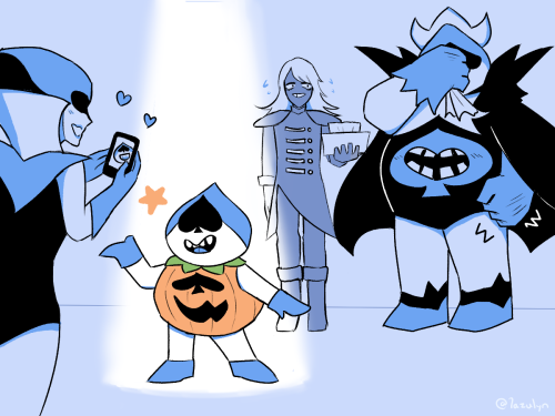 lancer shows his halloween costume to his dads