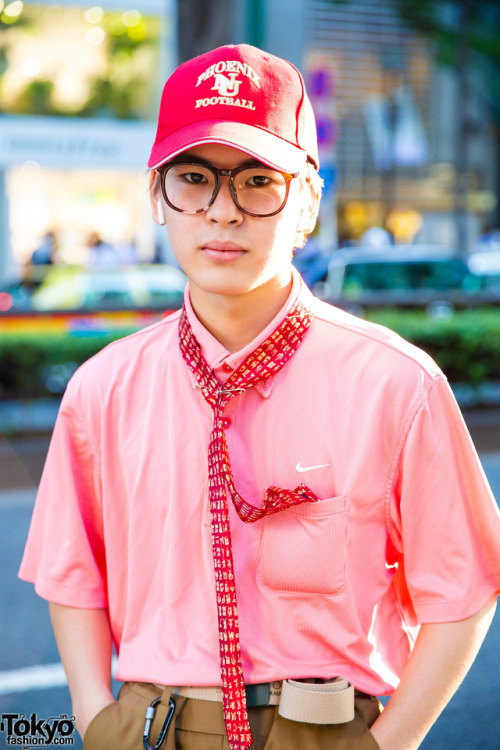 17-year-old Hikaru on the street in Harajuku. The high cuffs of his Soe pants and his red necktie ar