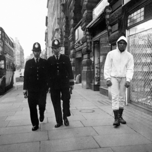 onceuponatown:  Muhammed Ali training on London’s streets, 1963.