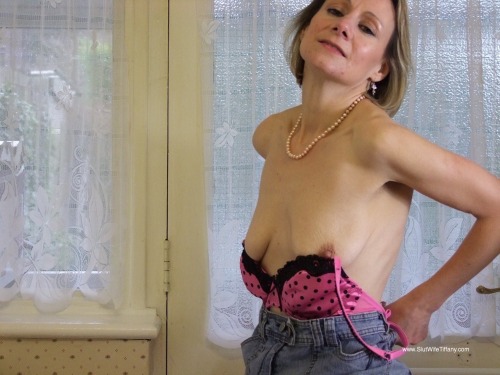 slutwifetiffany: Slut Wife Tiffany stripping in the kitchen at home