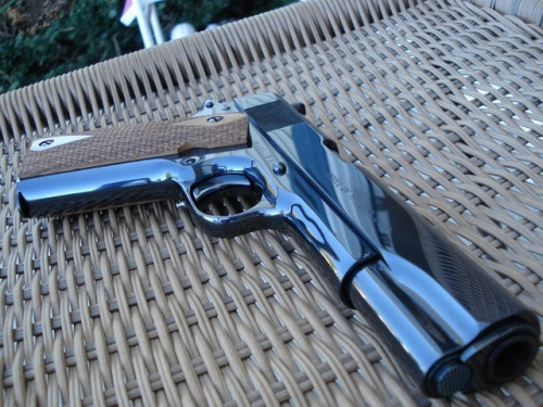 whiskeyandspentbrass:  Colt Royal Blue. You send send them your gun and they will give it this treatment if you ask really nicely. 