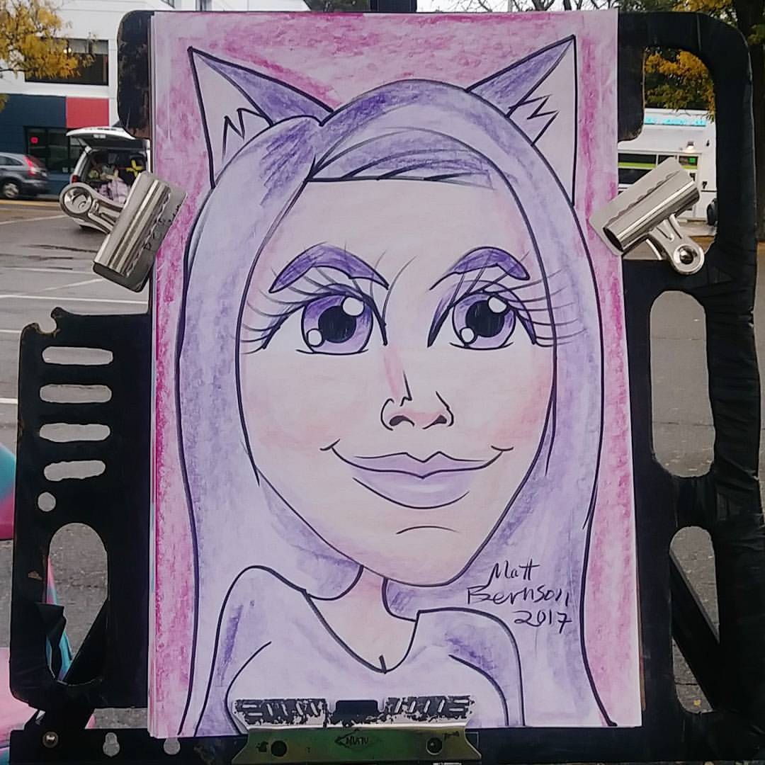Caricatures at the Central Flea today!      Purple cat lady.  It&rsquo;s right