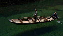 Valley in Ping Mountain屏山, Hefeng county鹤峰县, China. The water there is so clear that the boat is like floating in the air.