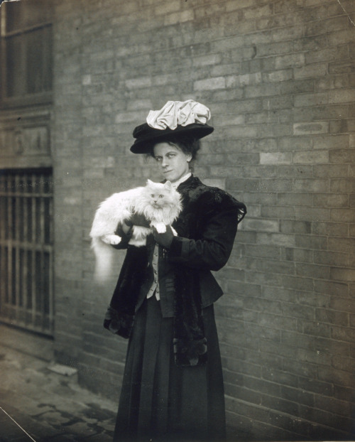 onceuponatown:Cat ownership is serious business. Ca. 1905-1910.