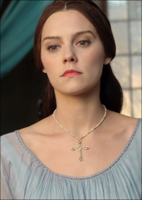 This cross necklace, adorned with pearls has been seen several times over the years. In 2011 it was 