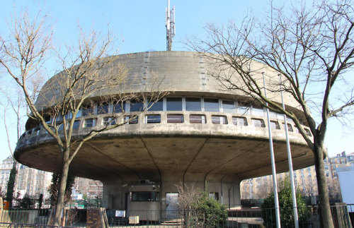 sosbrutalism:Just like the one from yesterday, ufo-like shaped buildings have always something speci