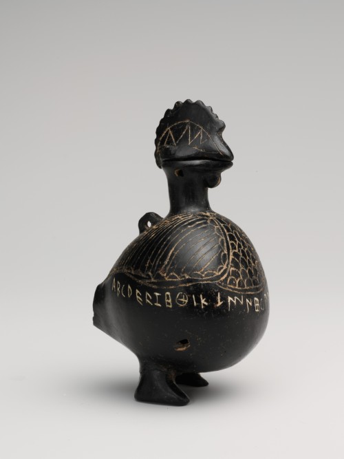 Vase in the shape of a cockerel inscribed with the Etruscan alphabet. c. 650 - 600 B.C.; bucchero. T