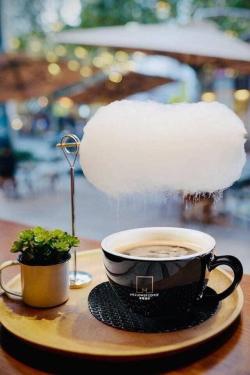 food-porn-diary:  This coffee is served with a cloud of “cotton candy”, the coffee vapor rises to dissolve the “cotton candy” and the cloud begins to rain with sugar over the coffee. Coffee “mellow” in Shanghai, China.