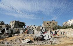 history-does-not-suck:  A mural of a playful-looking kitten, presumably painted by British street graffiti artist Banksy, is seen on a wall damaged in Beit Hanoun, Gaza Strip, Feb. 27, 2015. In a short film posted on his website, the popular street artist