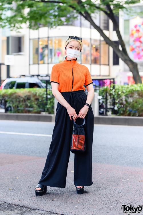 21-year-old freelancer Japanese model Saki on the street in Harajuku with an orange ribbed vintage t