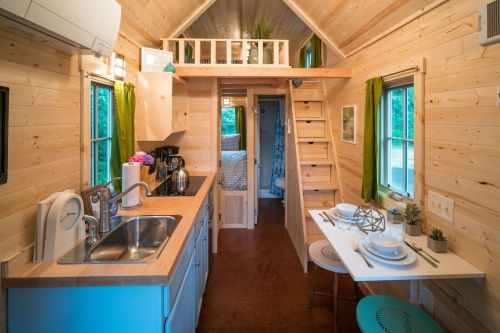 tinyhousetown:  Zoe, one of five tiny houses at the Mt. Hood Village Resort in Oregon. 