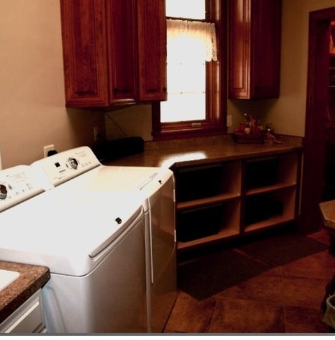 Traditional Laundry RoomMid-sized Traditional Single-wall Ceramic Tile Dedicated Laundry Room Idea With
