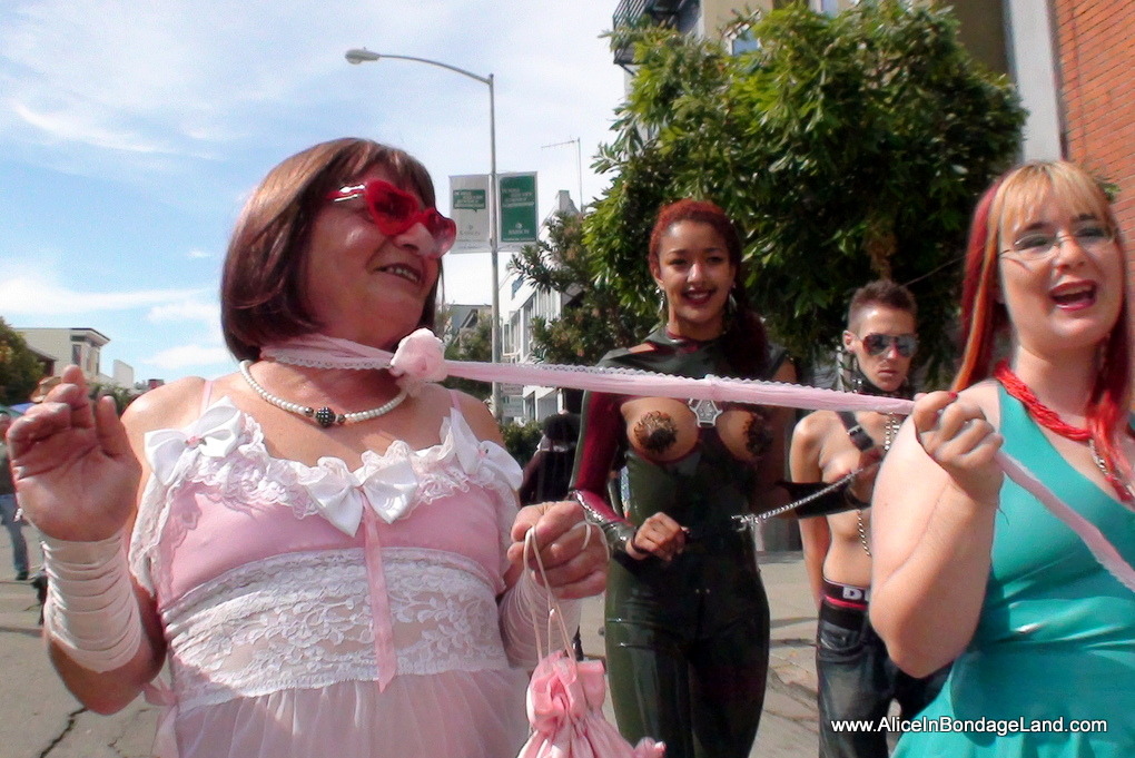 mistressaliceinbondageland: Folsom Street Fair sissy handjob on the corner of 8th