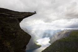 archiemcphee:  The Department of Awesome Natural Wonders just learned about an amazing field trip opportunity in Norway. That is, assuming you aren’t afraid of heights. This spectacular mountain vista is called Trolltunga, which translates to mean exactly