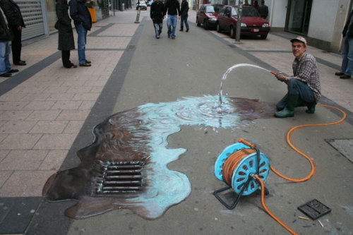 unknowngenre:  3D Pavement Drawings by Julian Beever  Anamorphic illusions are drawn in a special distortion in order to create an impression of 3 dimensions when seen from one particular viewpoint.  more 