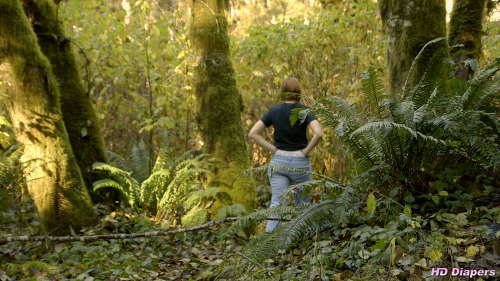 freefetishpics:  Check out the waistband of Sosha’s pullup in this video.Walking through the woods, Sosha is wearing a pullup under her jeans.   The waistband is peaking out, clearly visible.  We follow her,  enjoying the sight of her waistband as