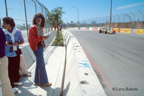 John Oates and George Harrison at the Long Beach Grand Prix, 2 April 1978; photo © Larry Roberts.On 