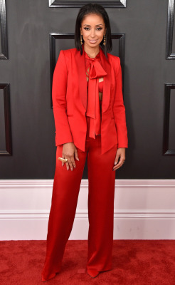 omgthatdress:  Mya wearing her valentine’s day red satin sheets.