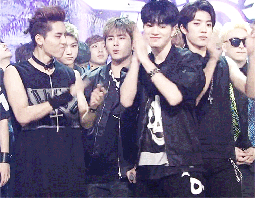 sungjongontop:  Hyper DongYeolJong at the end of Music Bank (ﾉ≧∀≦)ﾉ 
