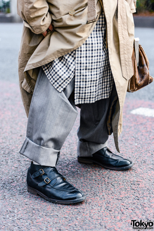 Japanese musician/actor/model Shouta on the street in Harajuku wearing a vintage overcoat with layer