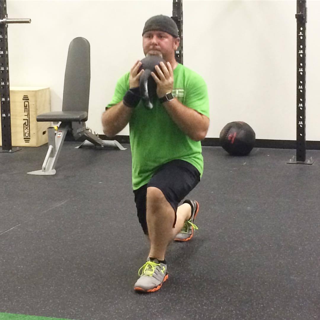 A Renaissance Woman • Reverse #kettlebell lunges with Jake! @h2ongo_jake...