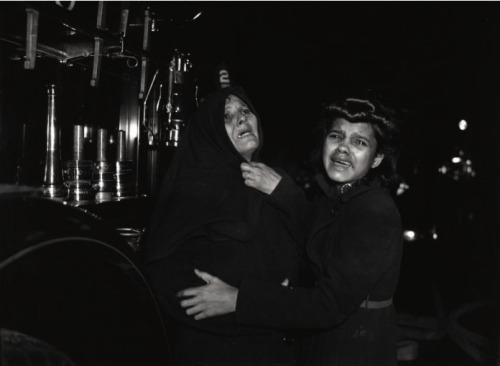  Weegee, “I  Cried When I Took This Picture”: Ms. Henrietta Torres and her daughter  Ada Watch as another daughter and her son die in fire, December 15, 1939  