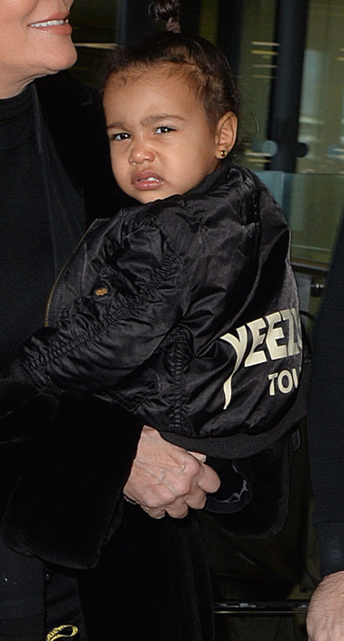 celebritiesofcolor:  North West with Kris Jenner at Heathrow Airport