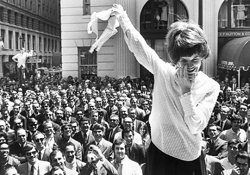 A Women&rsquo;s Liberation Movement demonstrator removes her brassiere during an anti-bra protes