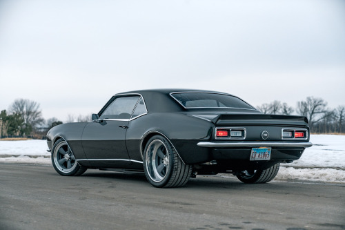 Just TRY not to stare. Jason’s amazing tuxedo black 1968 Chevrolet Camaro was built by the legendary