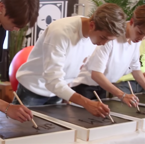 lq-joon: namjoon signing his name on the hollywood walk of fame in LA
