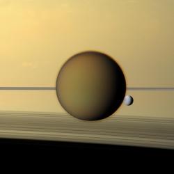 celestialreconnaissance:Views of Titan, Saturn’s largest (most interesting) moon, all from Cassini.