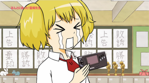 Assorted consoles in Honto ni Atta! Reibai Sensei. In the second screen cap she is crying because he