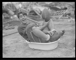 weirdvintage:  A member of the Quincy High School Football Team goofing off during their scrap metal drive, 1942 (via) 
