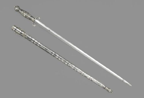 art-of-swords:  Short Sword with Scabbard Dated: circa 1753 Maker: unknown Place of Origin: Southeastern Europe Medium: steel, wood and silver niello work Measurements: blade length: 53.9 cm  Source: Copyright © 2014 The Wallace Collection  