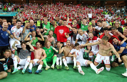 Players of Denmark celebrate their victory after the match vs. Czech Republic