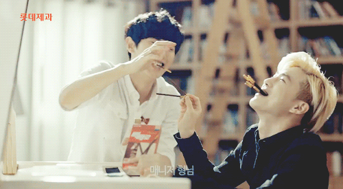 wintershower:  chanyeol stuffing a bunch of peppero into suho’s mouth .__. 